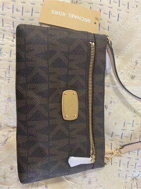 Michael Kors Dark Brown Monogram Wristlet with Gold Plate